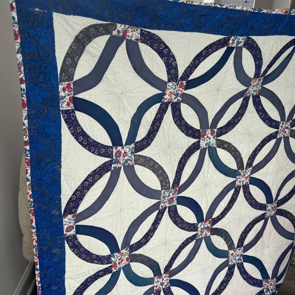 Blue and White Geometric Quilt with Navy Border